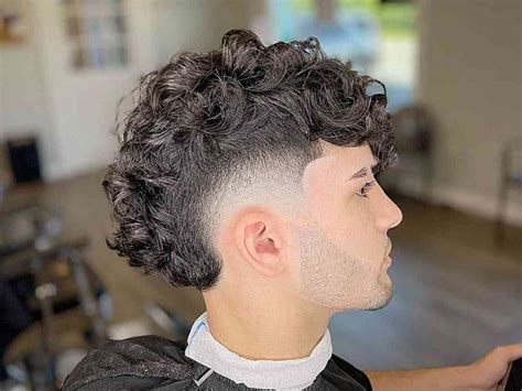 curly head burst fade|burst fade with fluffy hair.